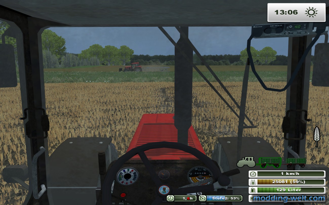 Case 1455 XL beim Weizen abfahren