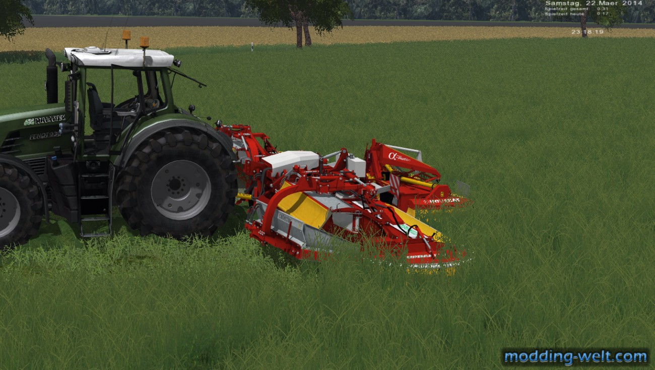 Mähen in Schubfahrt mit den Pöttinger Mähwerken und Fendt 936