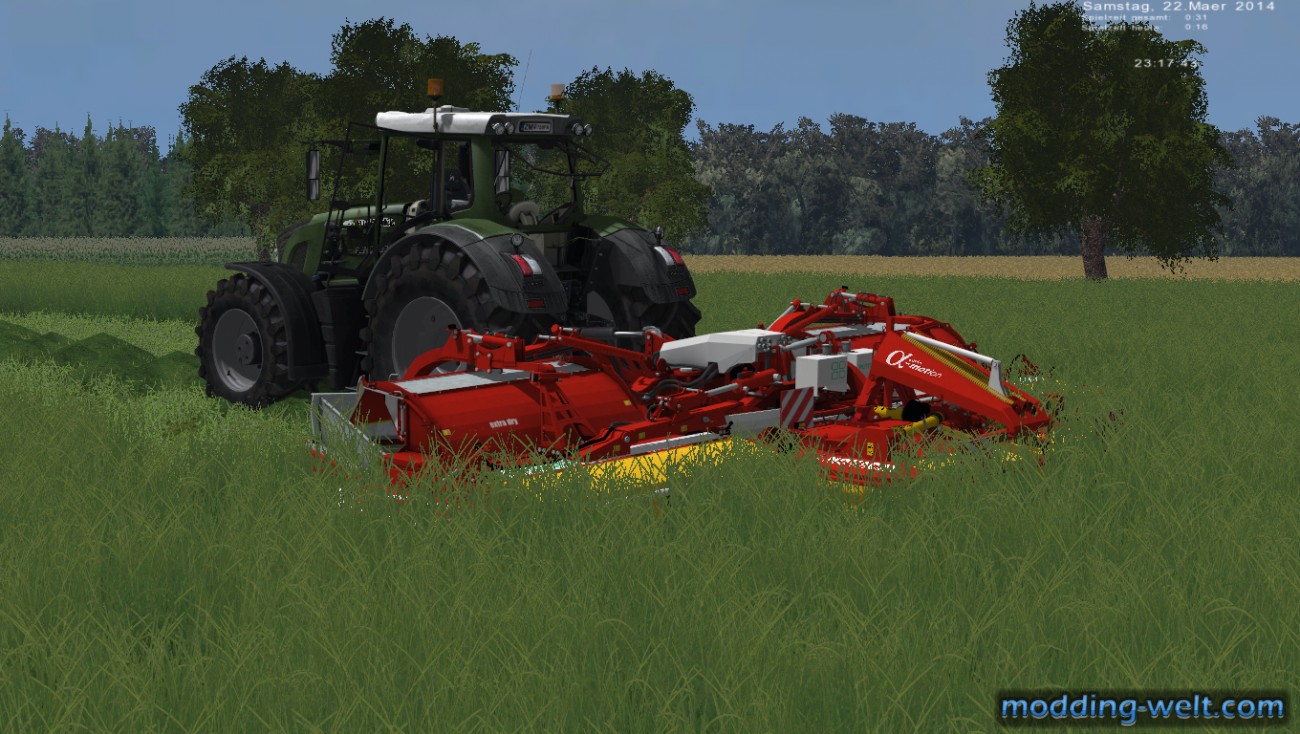 Mähen in Schubfahrt mit den Pöttinger Mähwerken und Fendt 936