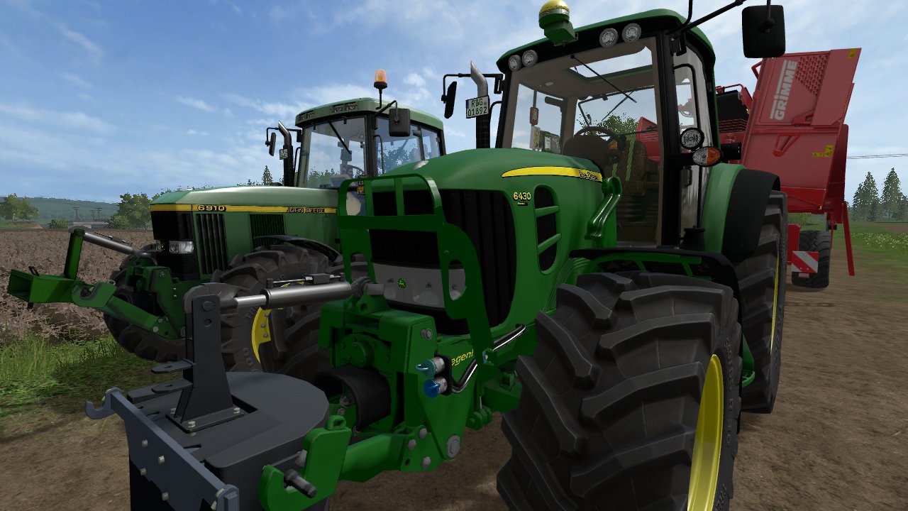 Der neue John Deere 6430 und der 6910 am Kartoffelroden