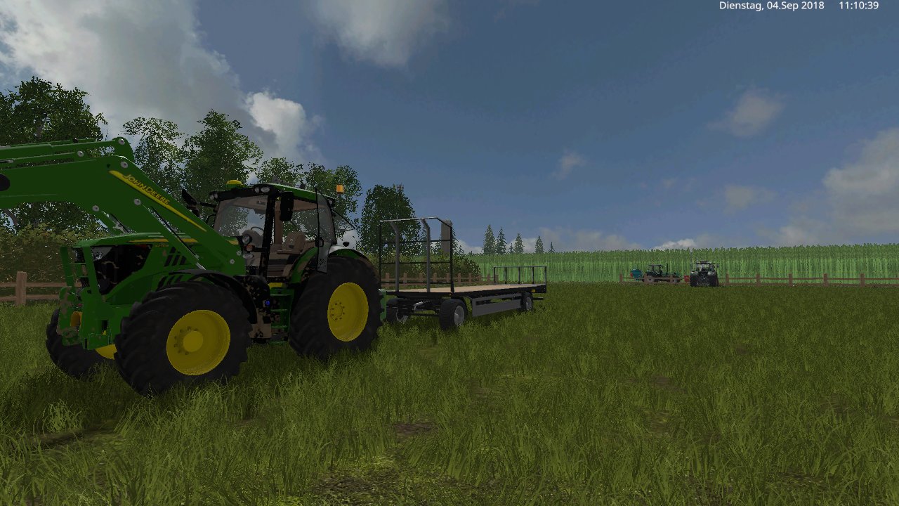 mit den john deere  und fliegl  ballen wagen die ballen holen