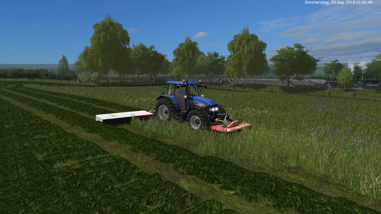 mit den hof schleper new holland tm und das claas disco3450 plus mähwerk und frondmähwerk pz greenland wisen mähen