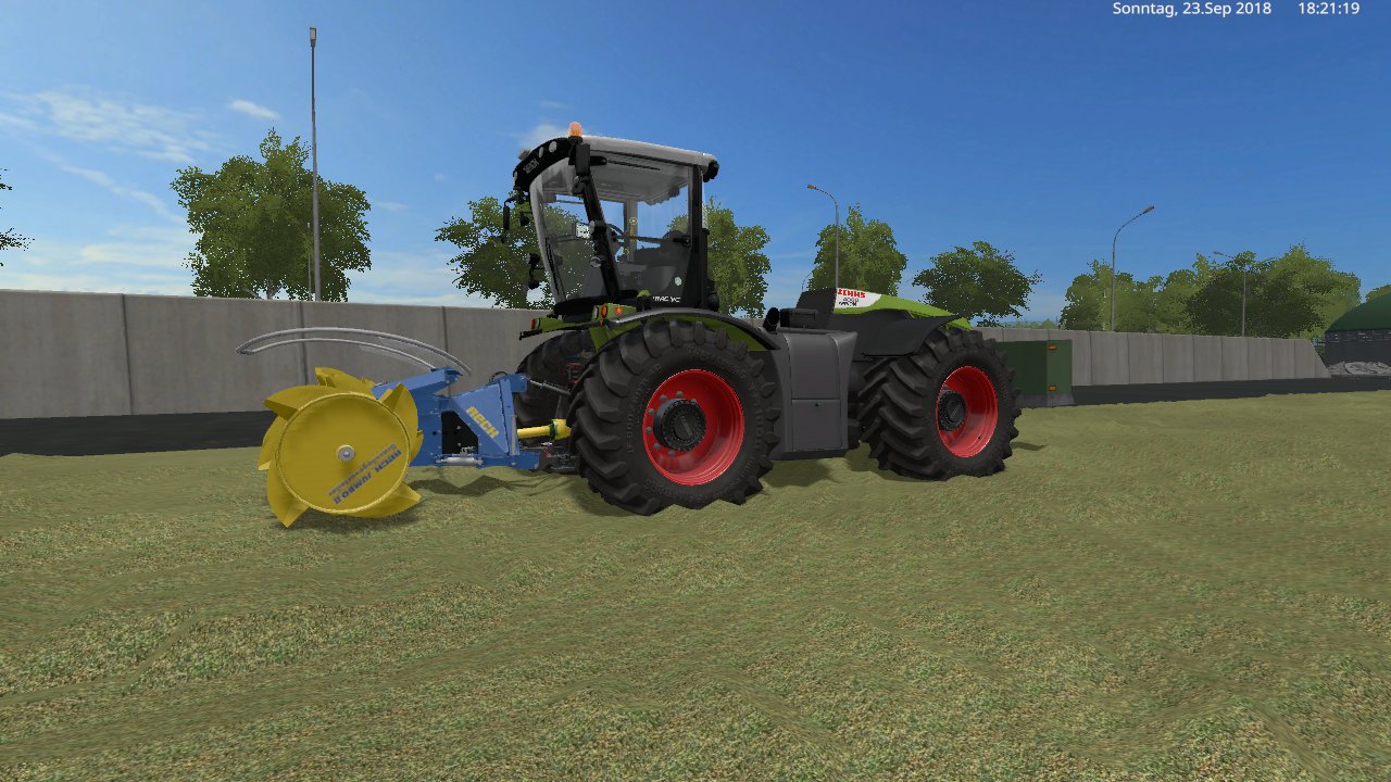 mit den claas xerion und der jombo reck auf den silohaufen