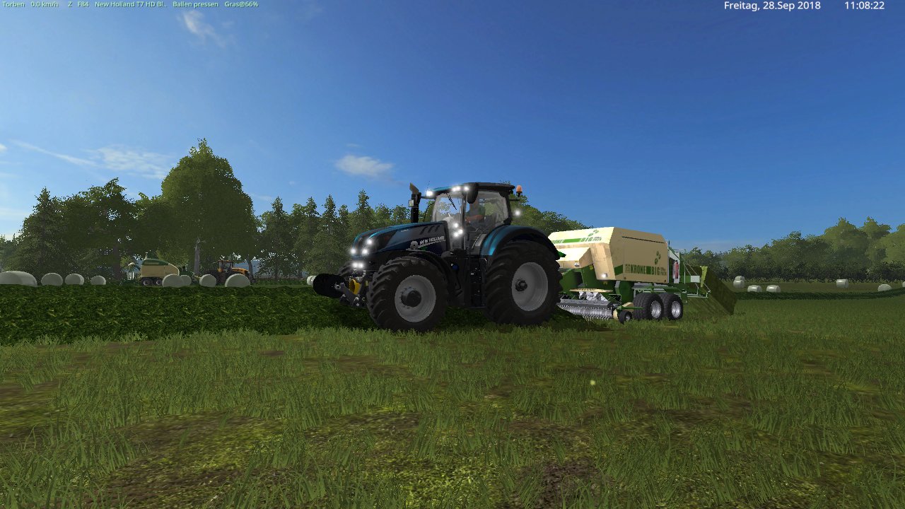 mit den new holland t7 und der krone big pack 120-80 gras ballen machen
