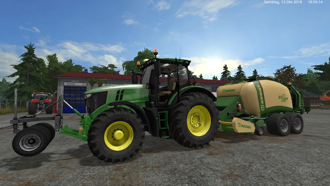 mit den john deere 6r und der krone big pack 1290