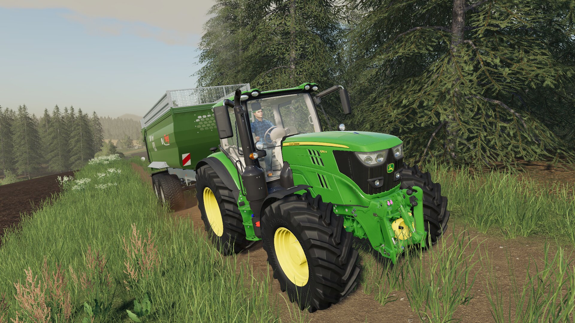 John Deere 6155R mit Fliegl TMK 264