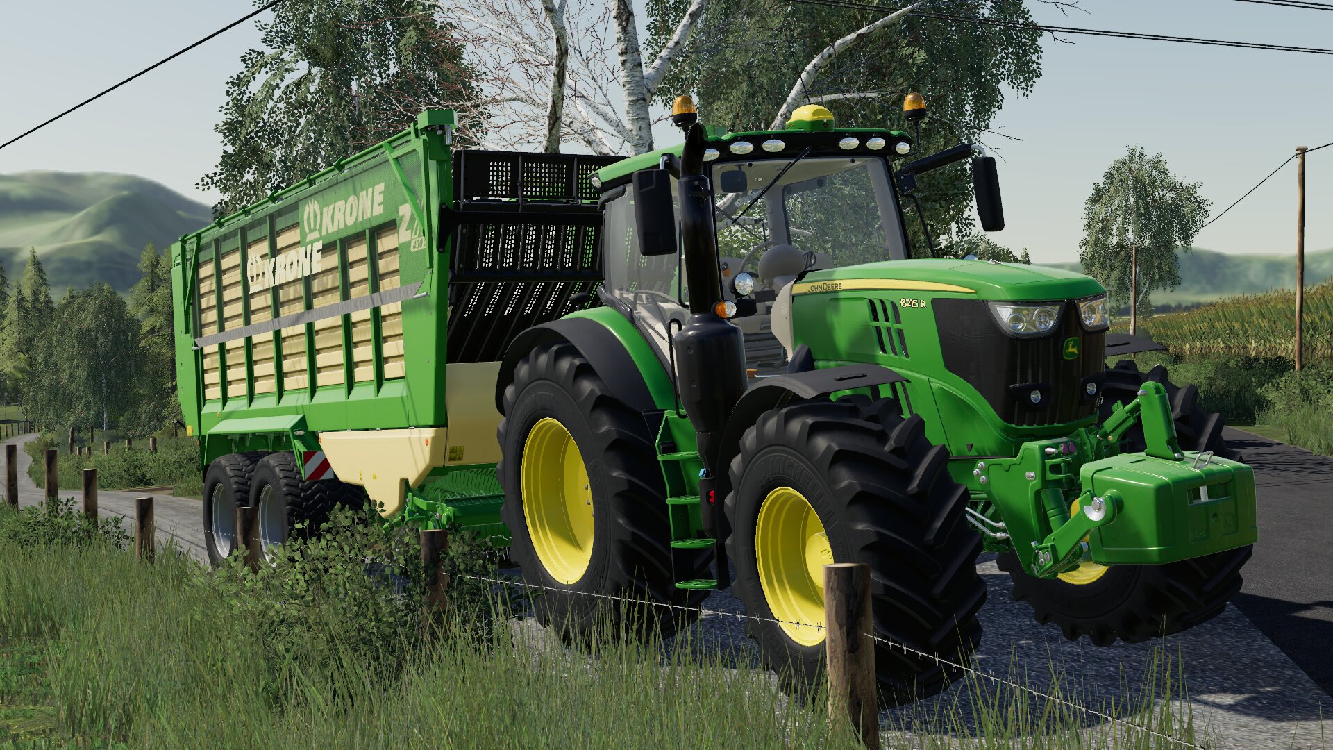 John Deere 6215R mit einem Krone ZX 430 GD