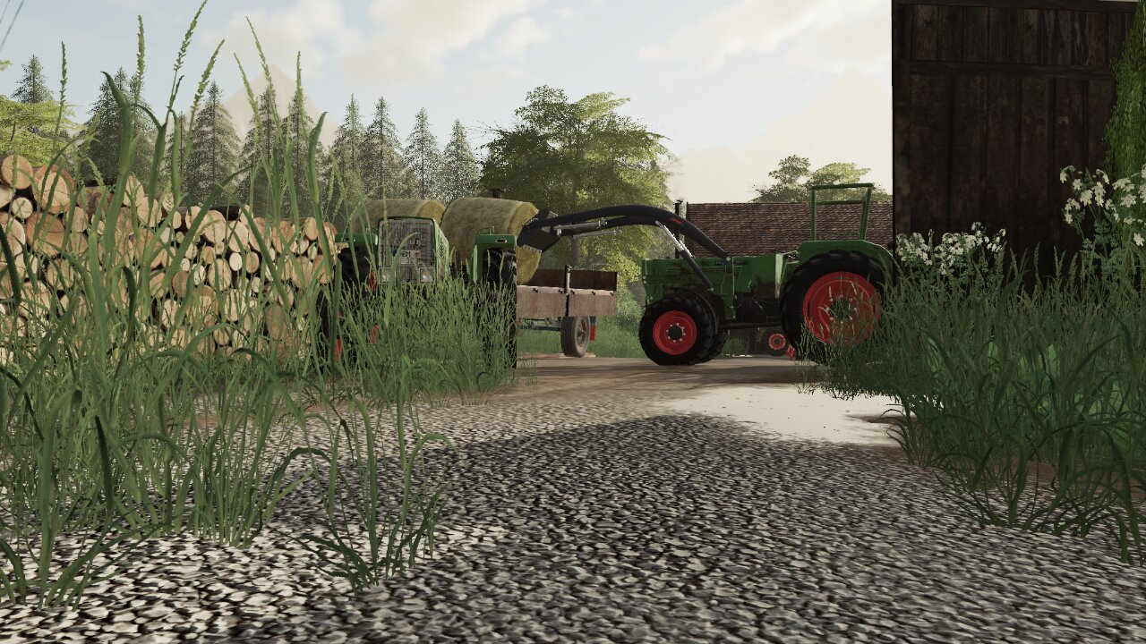 Heuballen einlagern mit den Flaggschiffen Fendt Farmer 106sa und Fendt Farmer 102s