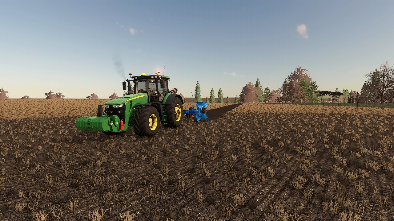 mit john deere auf dem feld