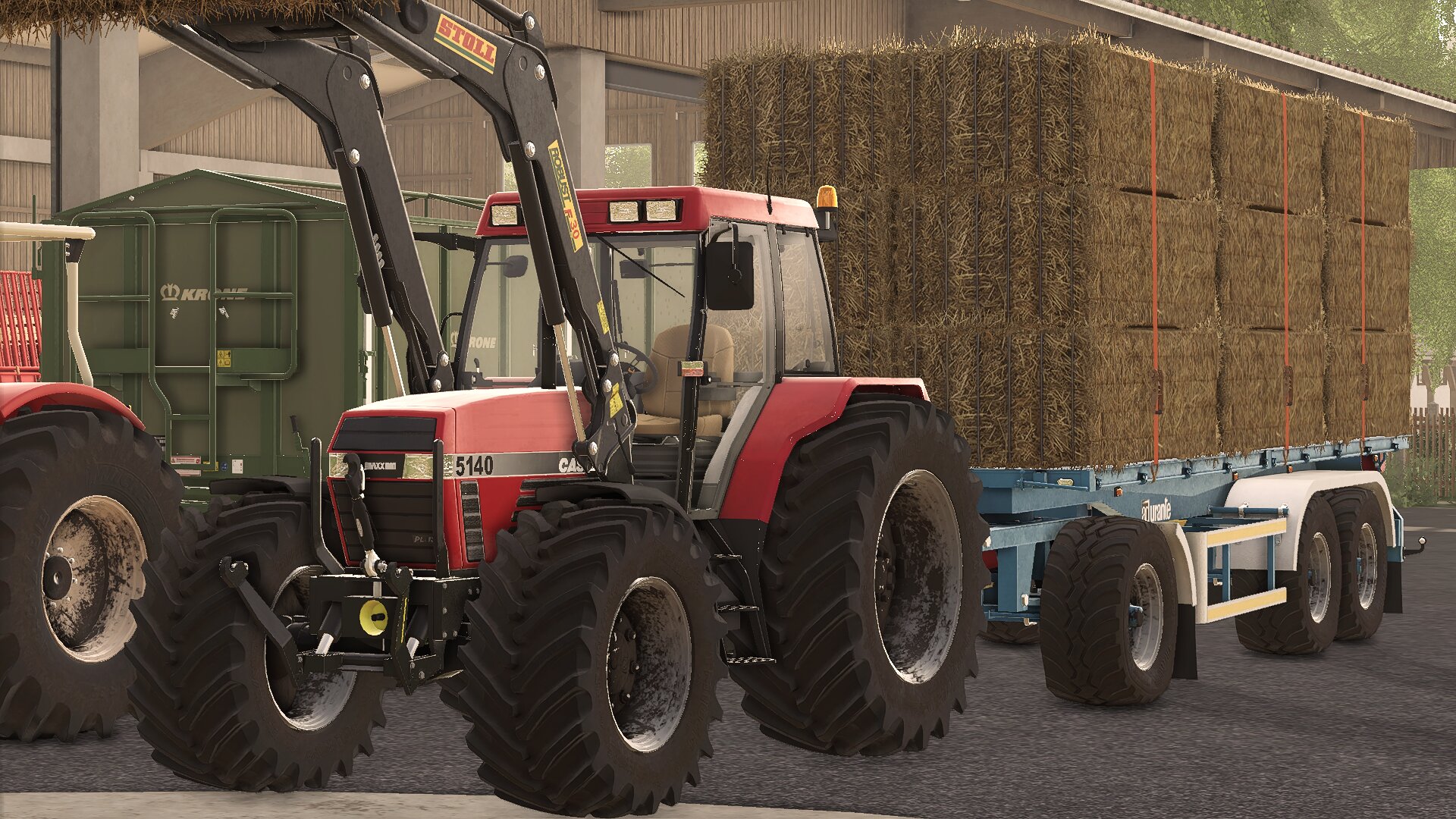 Maxxum 5140 am Ballen holen