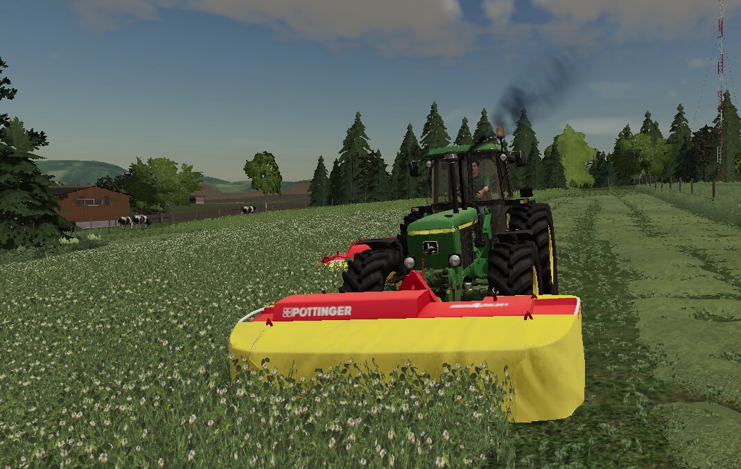 Mit dem John Deere 3050 Klee Mähen