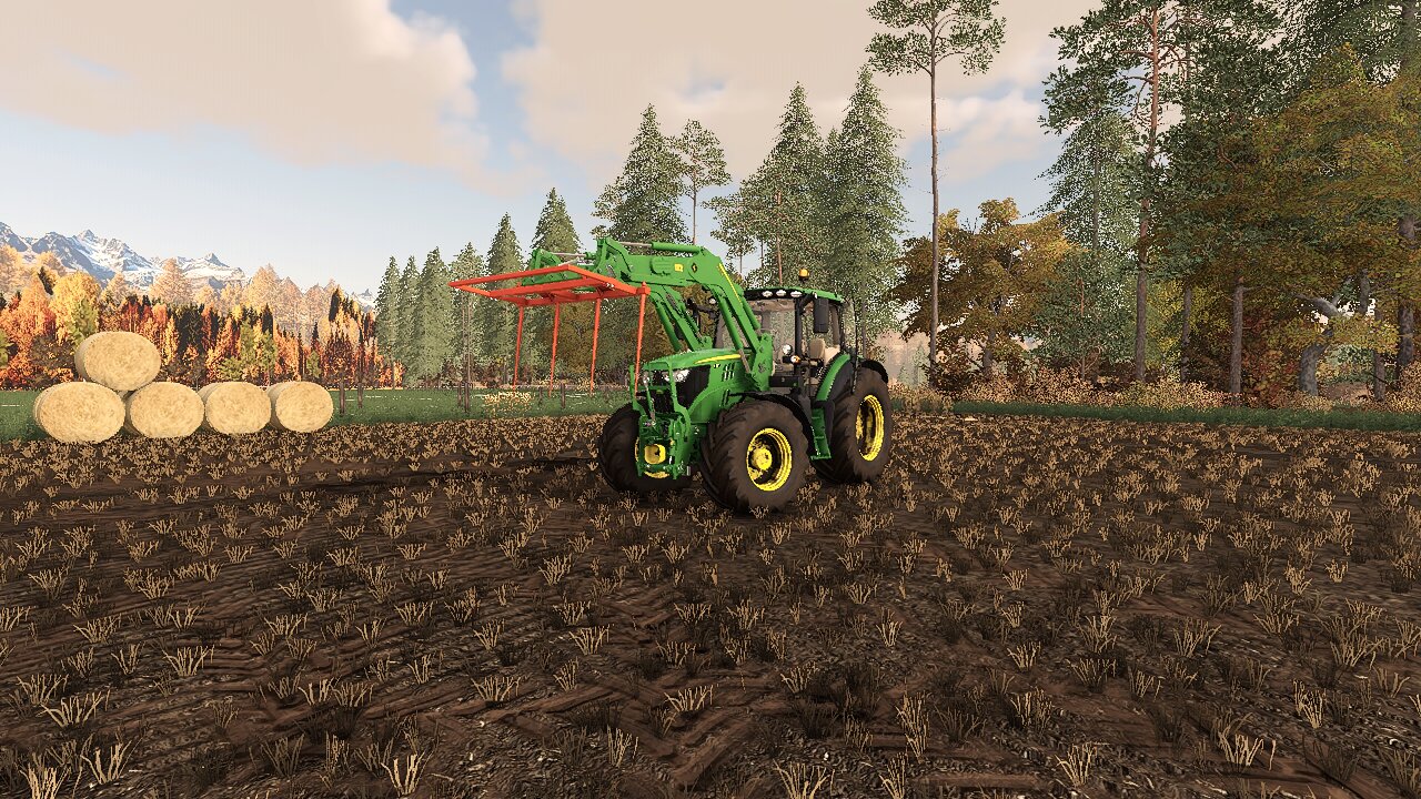 John Deere am ballen laden