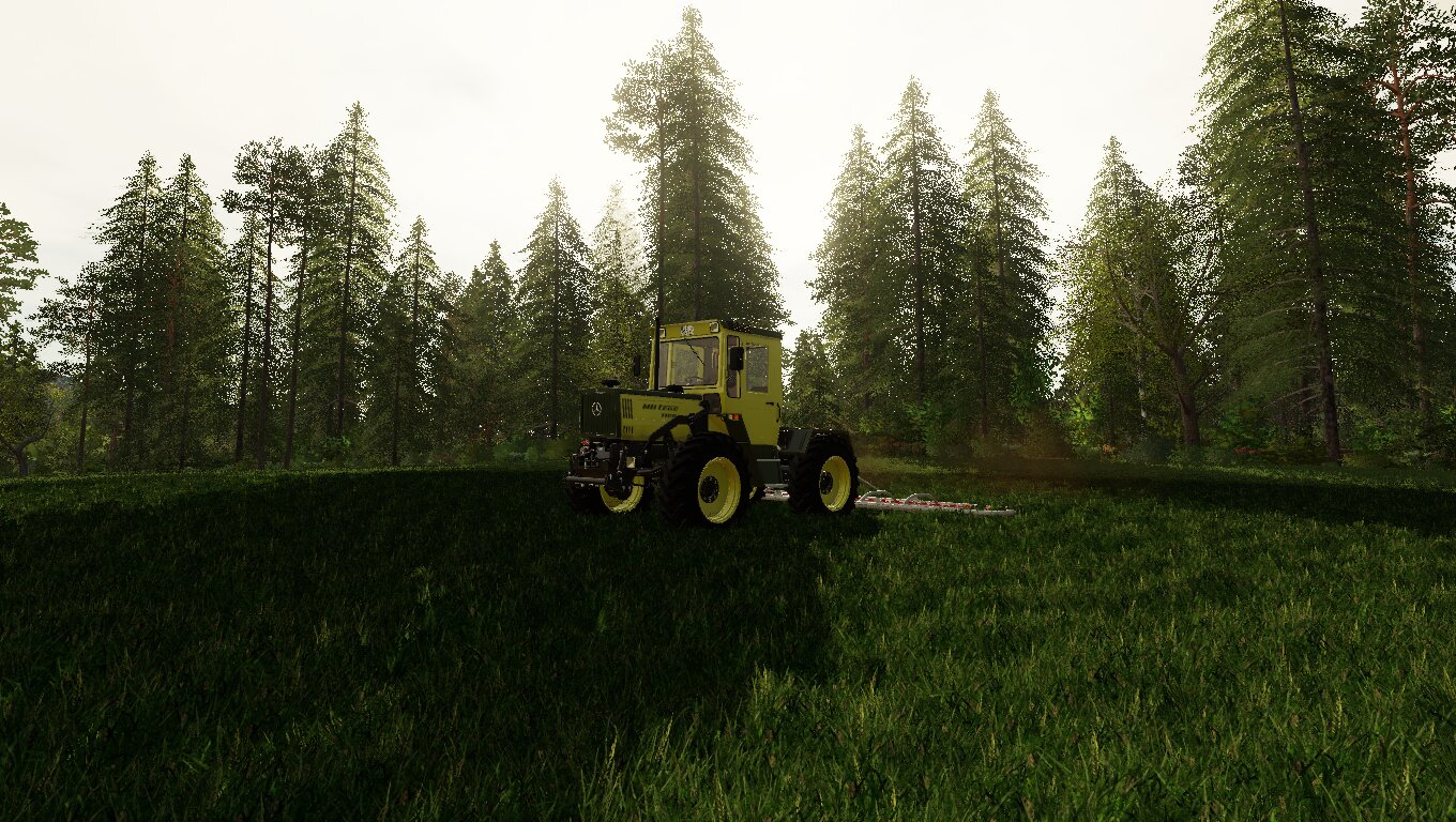 MB Trac 1100er beim Striegeln