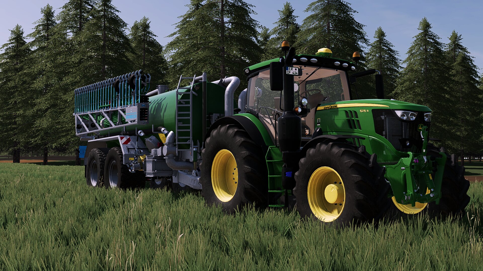 Die Ersten Gärreste auf die Wiesen ausbringen in Brandenburg mit einem John Deere 6215R und einem Kotte Garant PT 16000 mit einem Bomech Multi Profi 21/15.