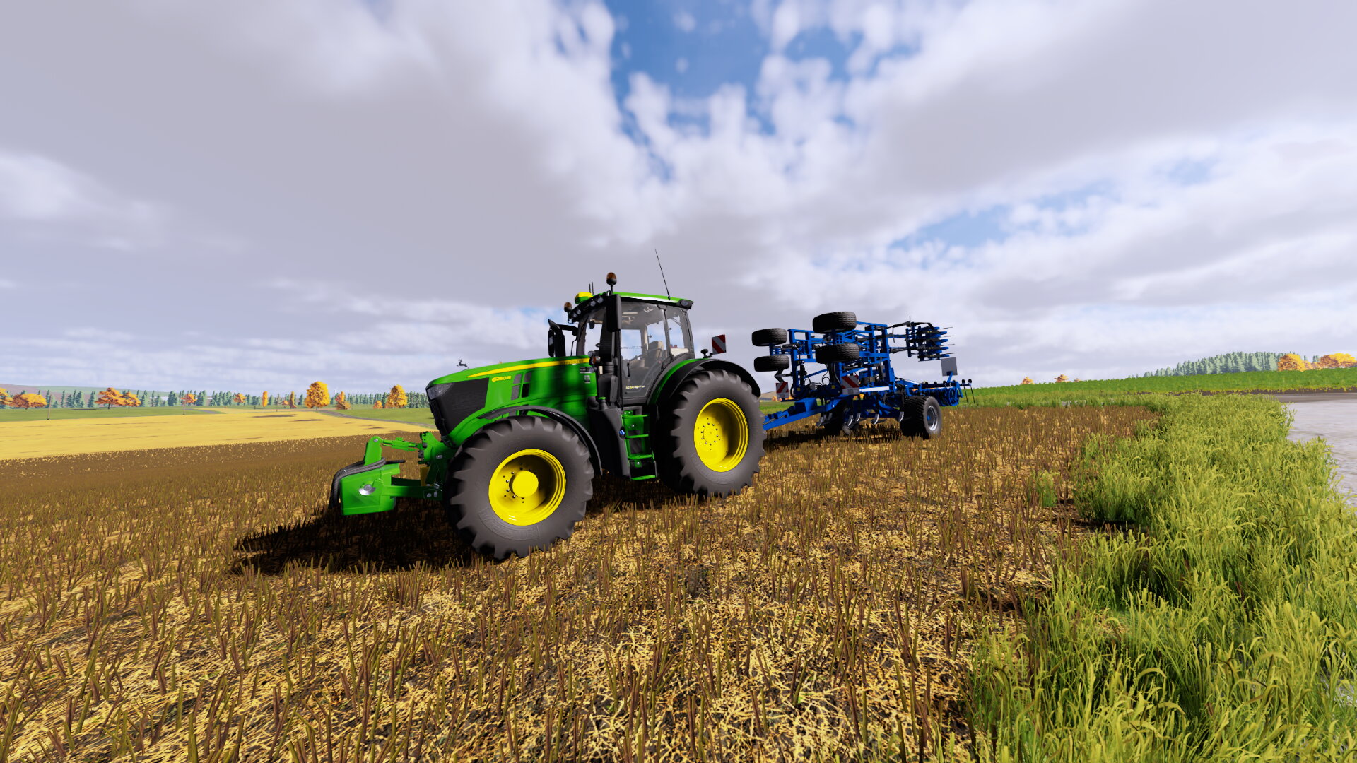 John Deere 6250R with 900 kg John Deere weight and a köckerling Vector 460