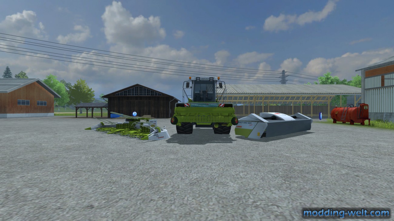 Claas Jaguar 890 mit Anbaugeräten
