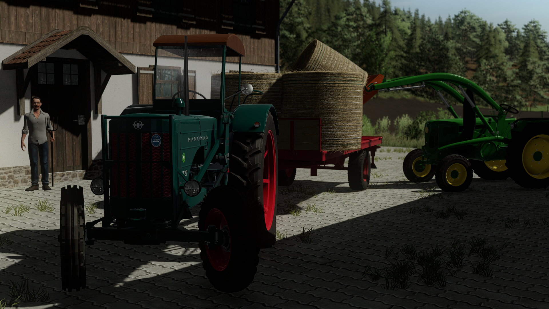 Hanomag r27 und John-Deere Lanz am Ballenladen