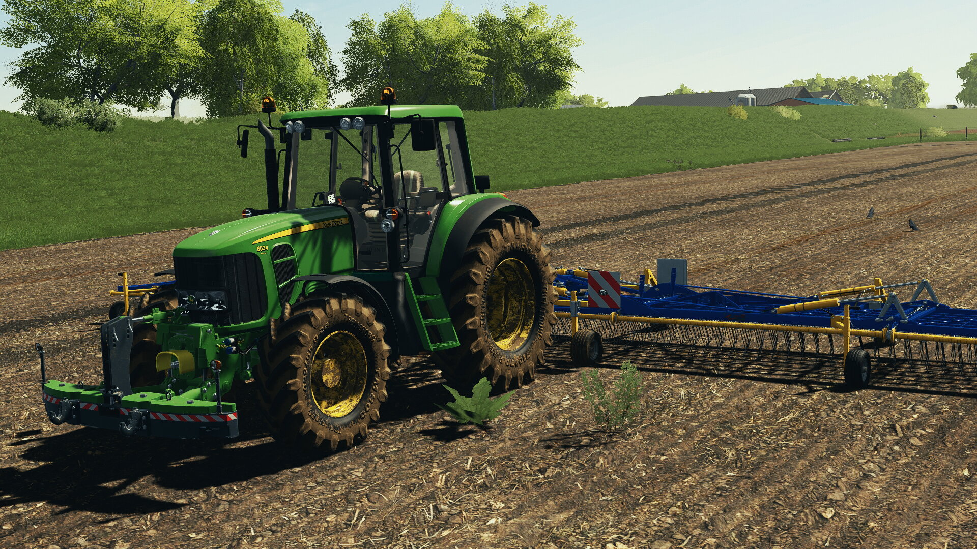 John Deere 6534 am blindstriegeln