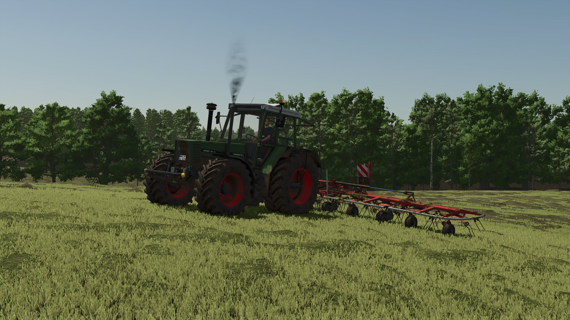 Fendt Favorit 615 LSA beim Zetten