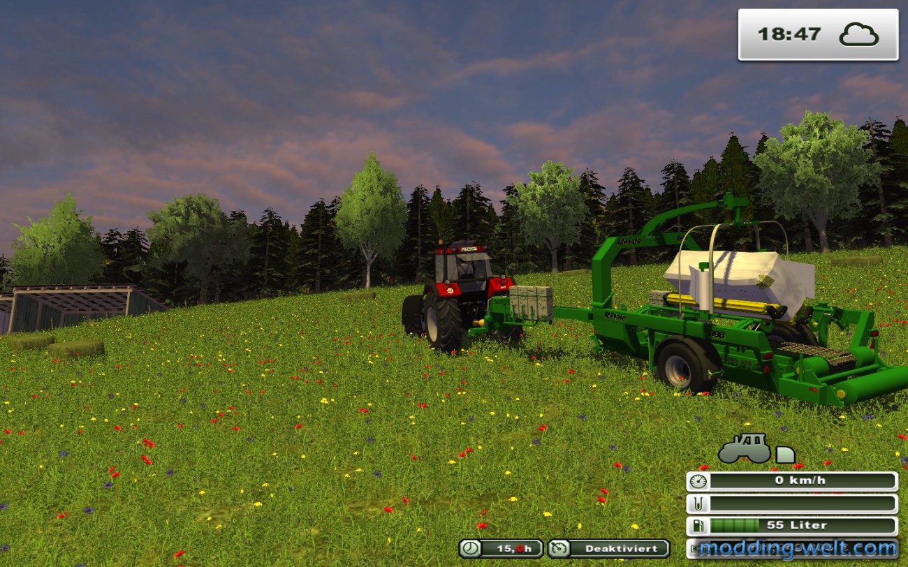 Case IH 1455 XL Profi beim Ballenwickeln