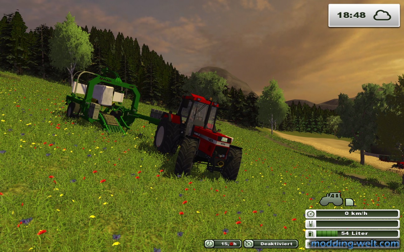 Case IH 1455 XL Profi beim Ballenwickeln