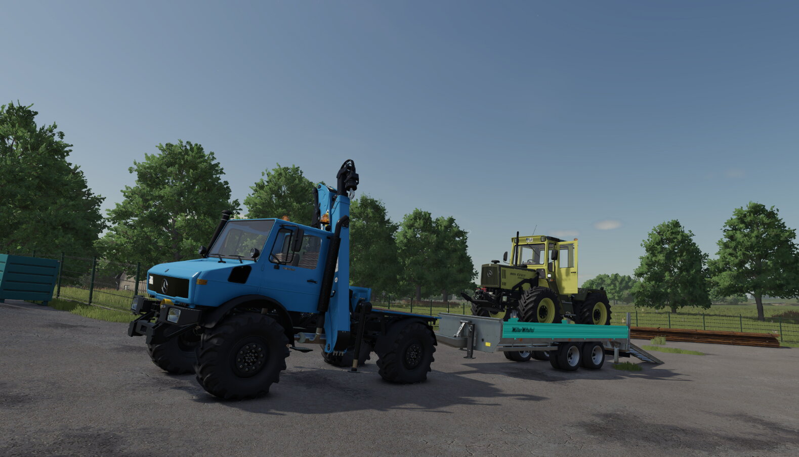 Mit den Unimog und Müller Mitteltal Tieflader einen Mb-Trac abholen
