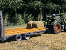 Stroh Ballen vom Feld holen