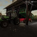 Mit dem Deutz Agrotron 150 Korn abfahren