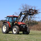 New Holland M115 am Wieseneggen